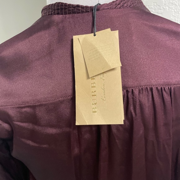 New authentic Burberry silk stretchy blouse in burgundy  with a bow on a front. - Picture 4 of 8